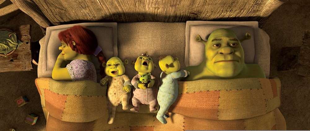 Shrek Forever After Shrek Fiona and the kids laying in bed