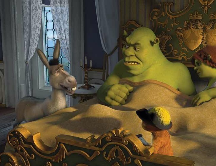 Shrek the Third Donkey, Puss in Boots, Shrek, and Fiona in bed