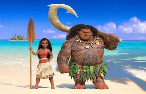 Moana and Maui standing on the beach
