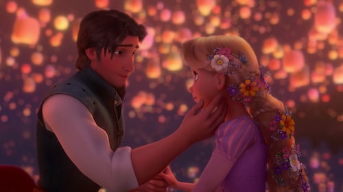 Rapunzel and Flynn Rider sitting on a boat facing each other about to kiss
