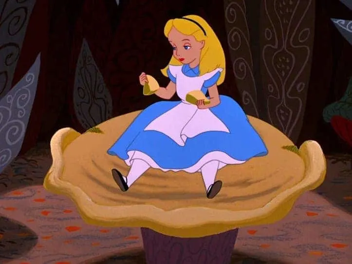 Alice sitting on a large mushroom top