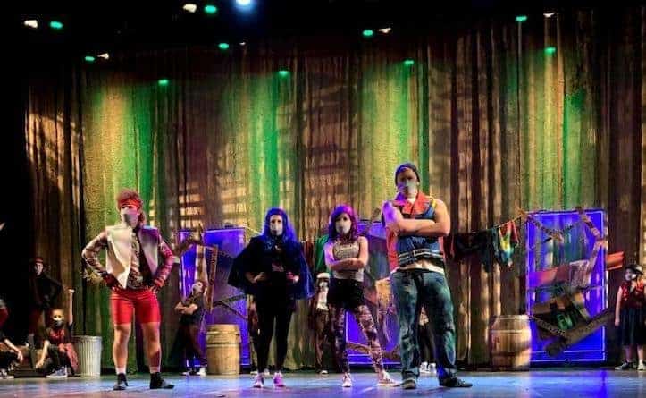 Descendants the musical cast singing on stage