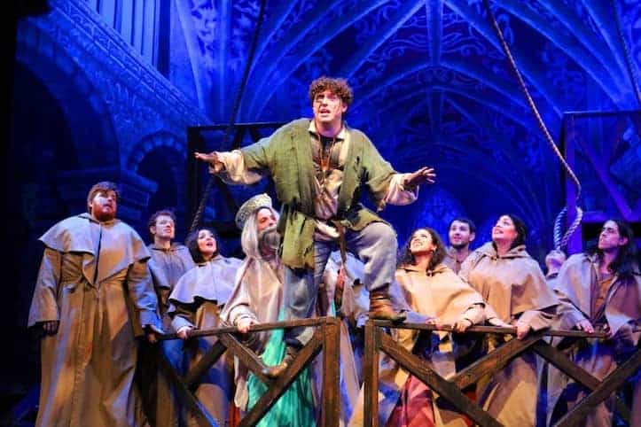 The Hunchback of Notre Dame musical cast singing on stage