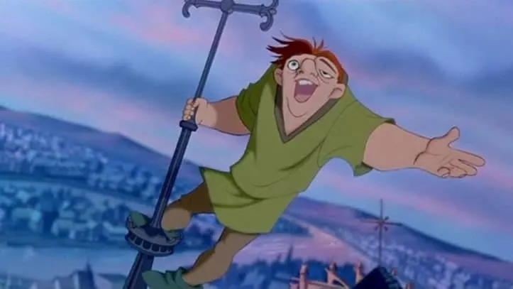 The Hunchback of Notre Dame singing on the top of the tallest roof