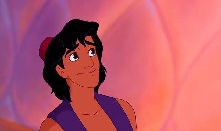 Aladdin wearing his purple vest and small red hat with medium length dark brown hair