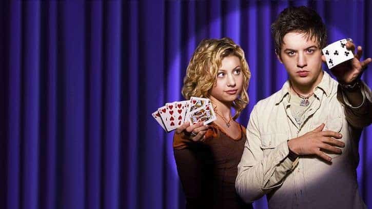 Allyson and Danny holding playing cards