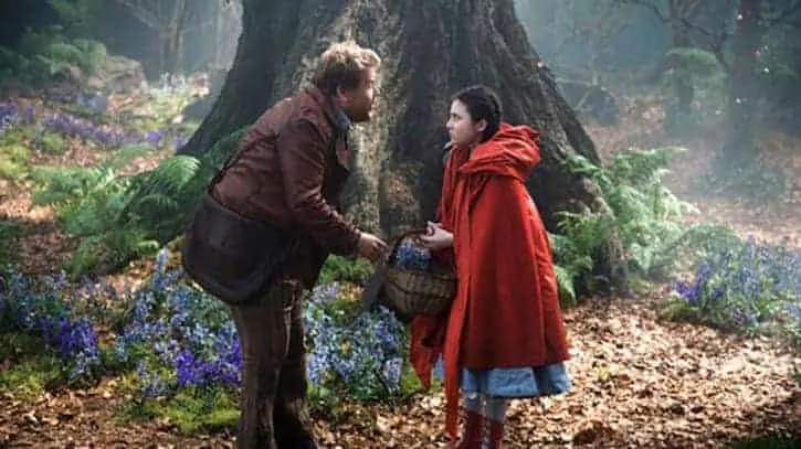 Baker and the Little Red Riding Hood talking in the forest