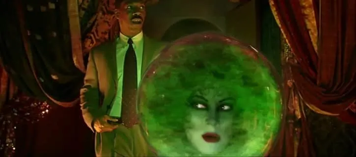 Jim Evers talking to Madame Leota who is in a magic crystal ball