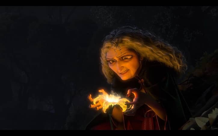 Old mother gothel holding the magical yellow flower