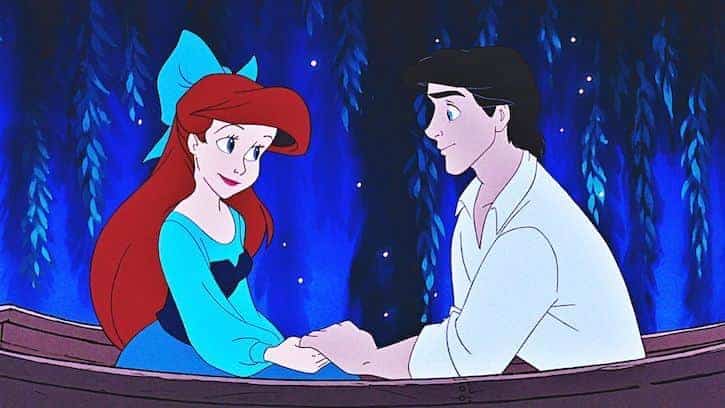 Prince Eric and Princess Ariel sitting in a row boat at night holding hands