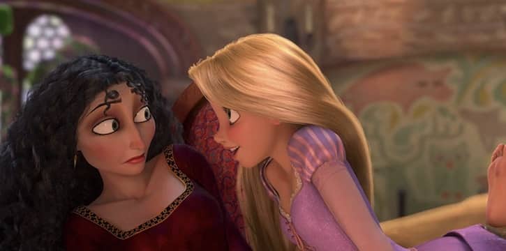 Rapunzel getting close to Gothel and holding her arm