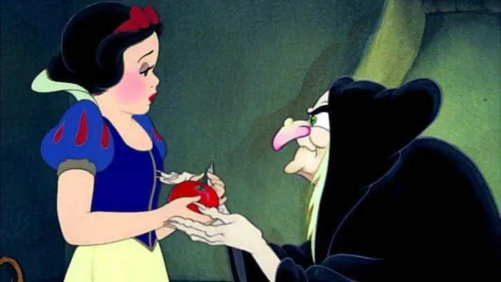The Hag handing Snow White a poisoned red apple