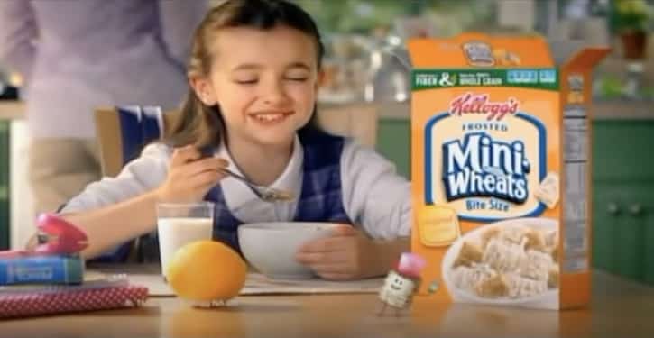 Mini as a cereal mascot and Mini Wheats cereal with a young girl eating the cereal