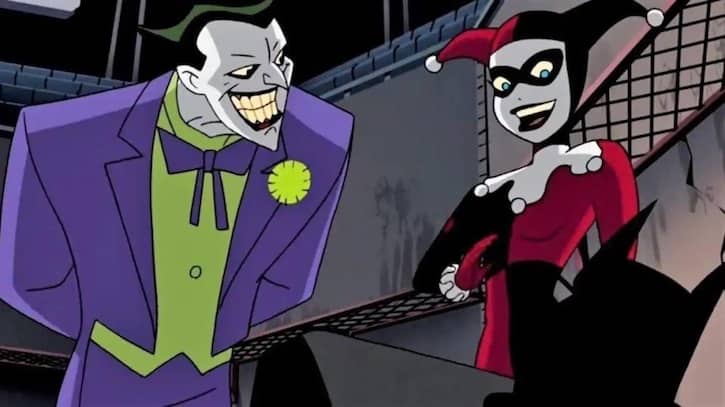 The Joker and Harley Quinn talking to Batman