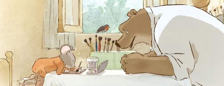 Ernest and Celestine painting at the kitchen table