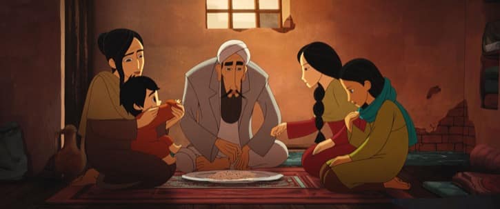 The Breadwinner Parvana and her family sitting down for dinner together