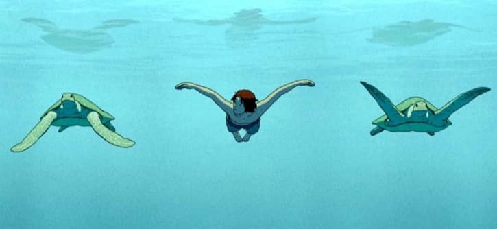 The Red Turtle movie showing The father swimming with two turtles