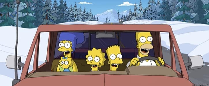 The Simpsons family riding in a car down a snowy road