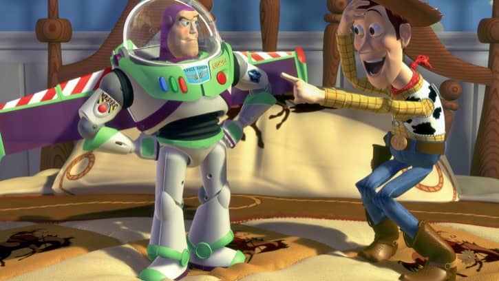 Toy Story 1995 Woody and Buzz standing on Andy's Bed