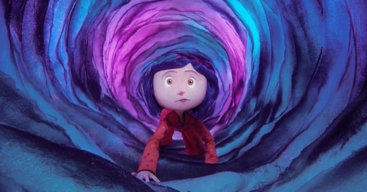 Coraline crawling through a tunnel