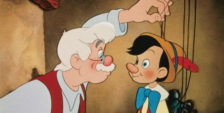 Geppetto putting the finishing touches on his puppet Pinocchio