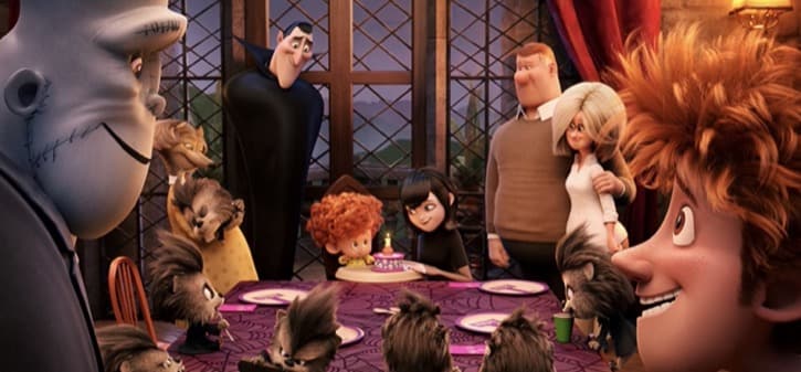 Hotel Transylvania 2 Dennis ready to blow out his birthday cake candle with family gathered around the table