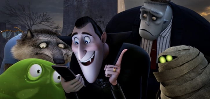 Hotel Transylvania 2 Dracula, Wayne, Blobby, Griffin, and Frankenstein looking at Dracula's phone
