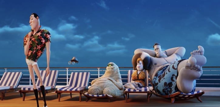 Hotel Transylvania 3 Summer Vacation Dracula standing in short white shorts with Griffin, Murray, Frankenstein, and Eunice in lounge chairs