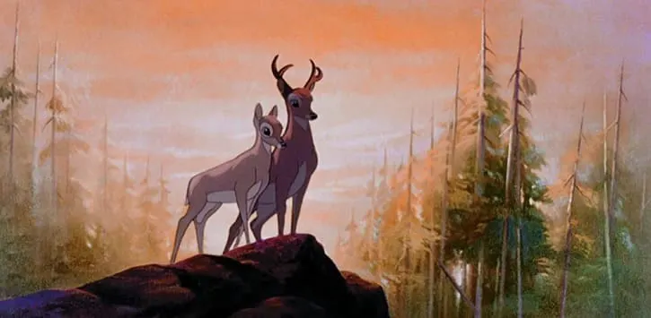 Bambi and Faline all grown up standing tall together on a big rock looking over the land
