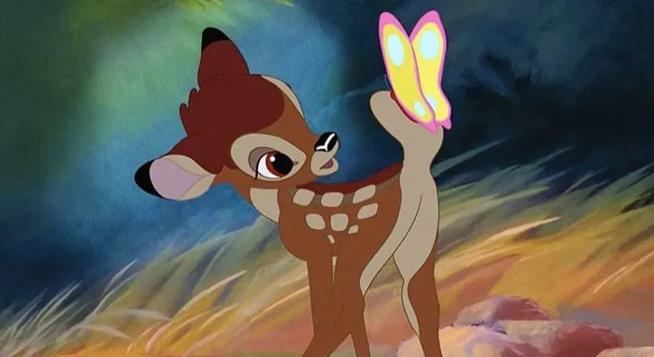 Bambi looking back at a butterfly that landed on his tail