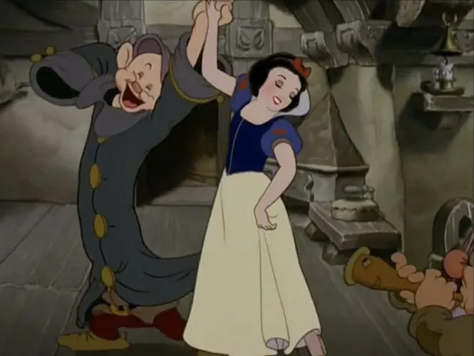 Dopey dancing with Snow White