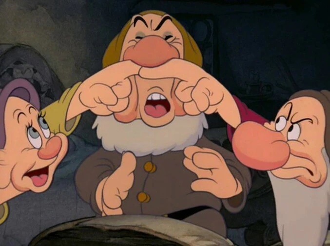 Dopey and Grumpy holding Sneezy's nose so he doesn't sneeze