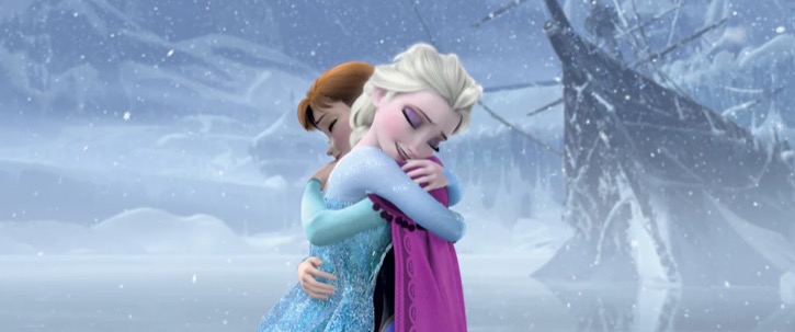 Elsa image hugging her sister Anna outside in the falling snow