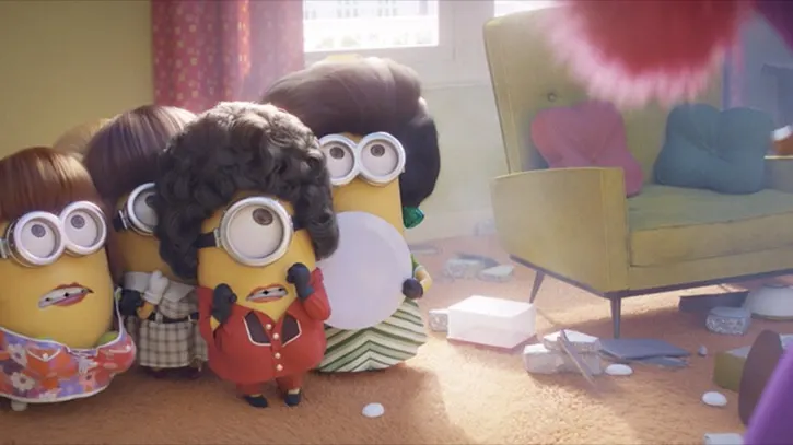 Four Minions dressed up as ladies