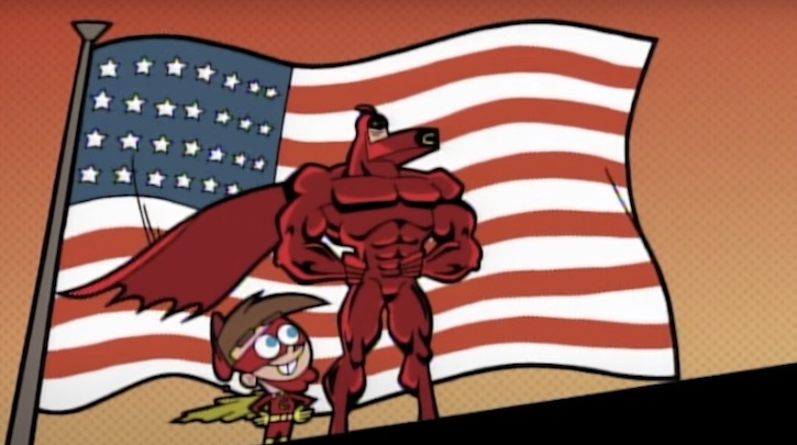Timmy and Crimson Chin standing proud in front of a large American flag