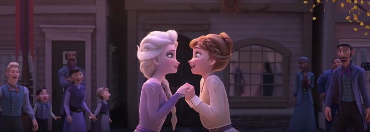Anna and Elsa singing in the town square