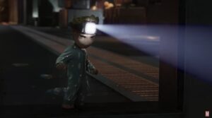 Groot walking around at night with lamp on his head