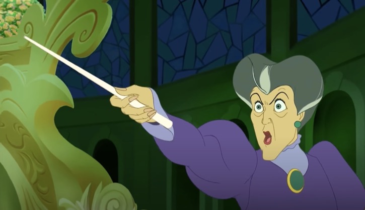 Lady Tremaine pointing her new magic wand and shouting