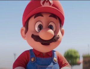 mario watching toad use the clear tubes for transportation